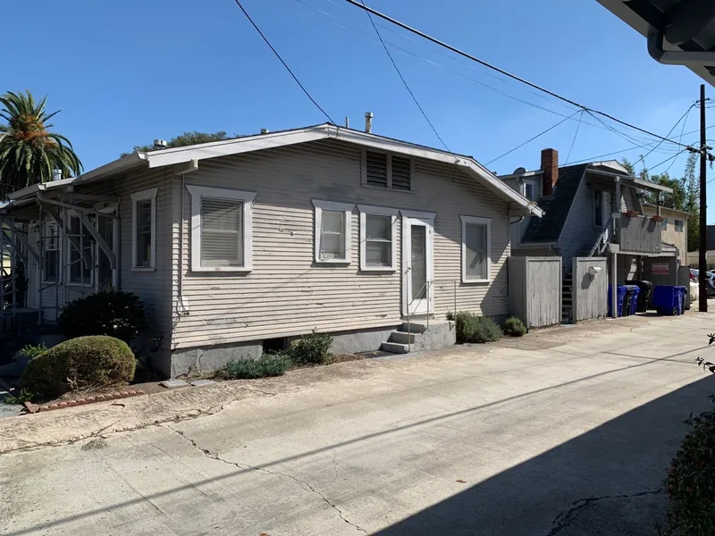 Rear of a craftsman bungalow after exterior painting