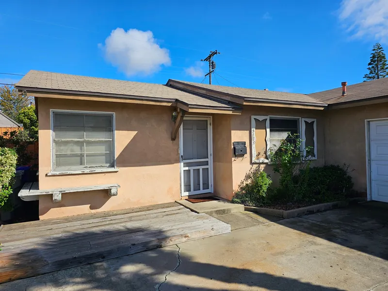 Tan stucco ranch home in Clairemont before its exterior renovation