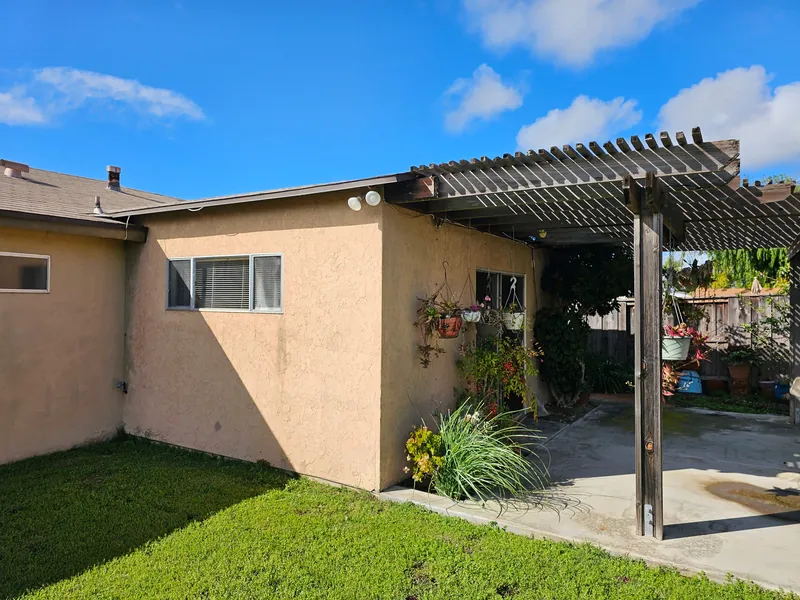 Patio cover and stucco walls before the renovation