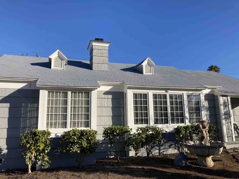 Crown Point beach house after full exterior painting and restoration