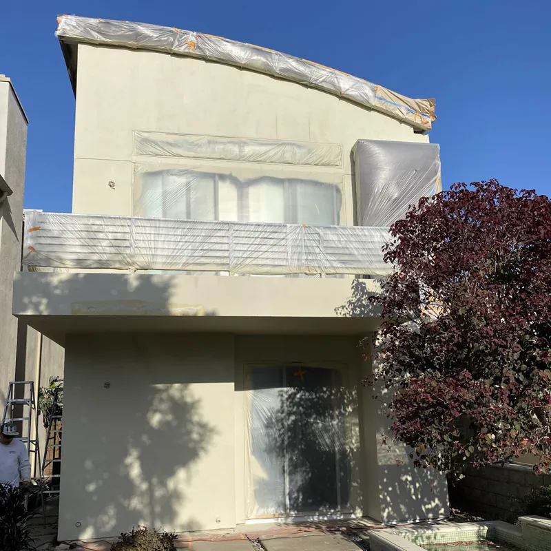 Coronado home front wrapped and masked before exterior painting
