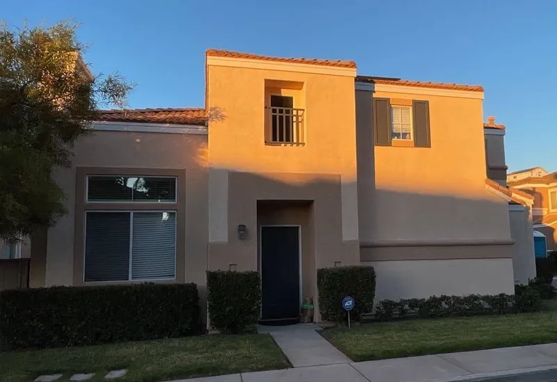 Two-story stucco home in La Mesa after exterior painting