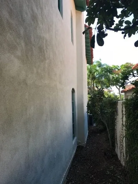Side wall after stucco repair and repainting