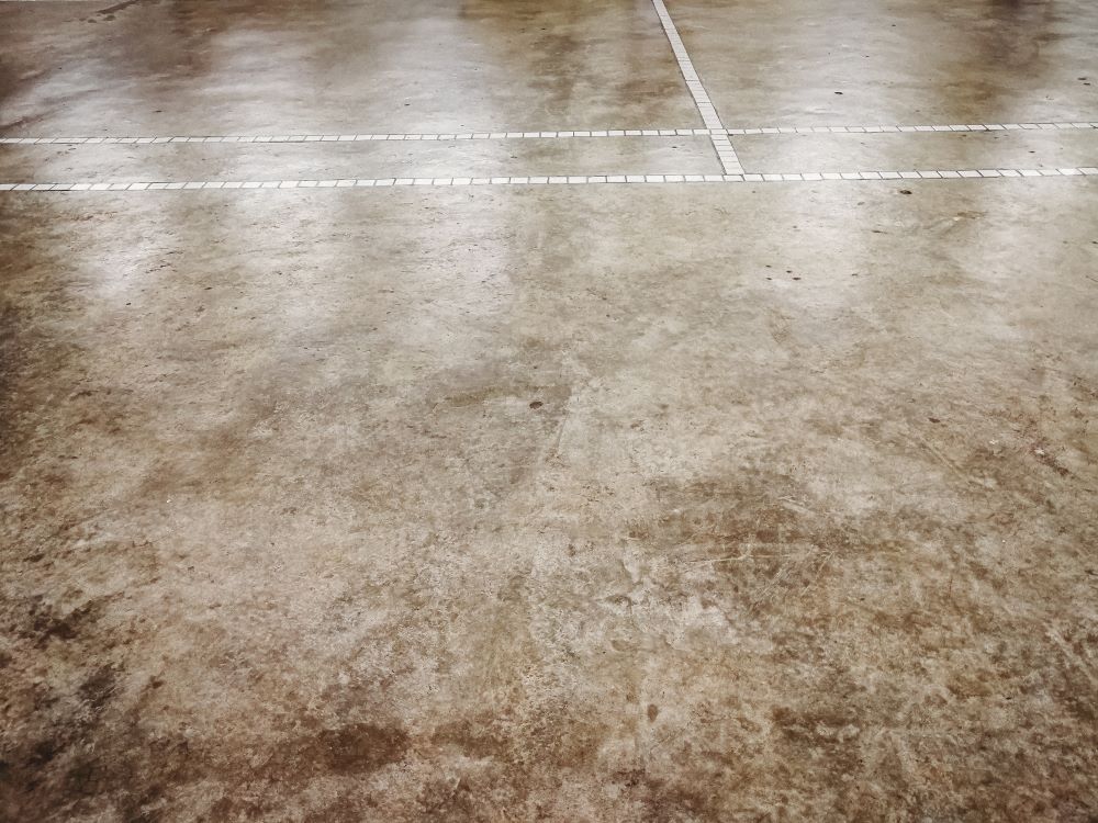 Concrete floor with white line markings